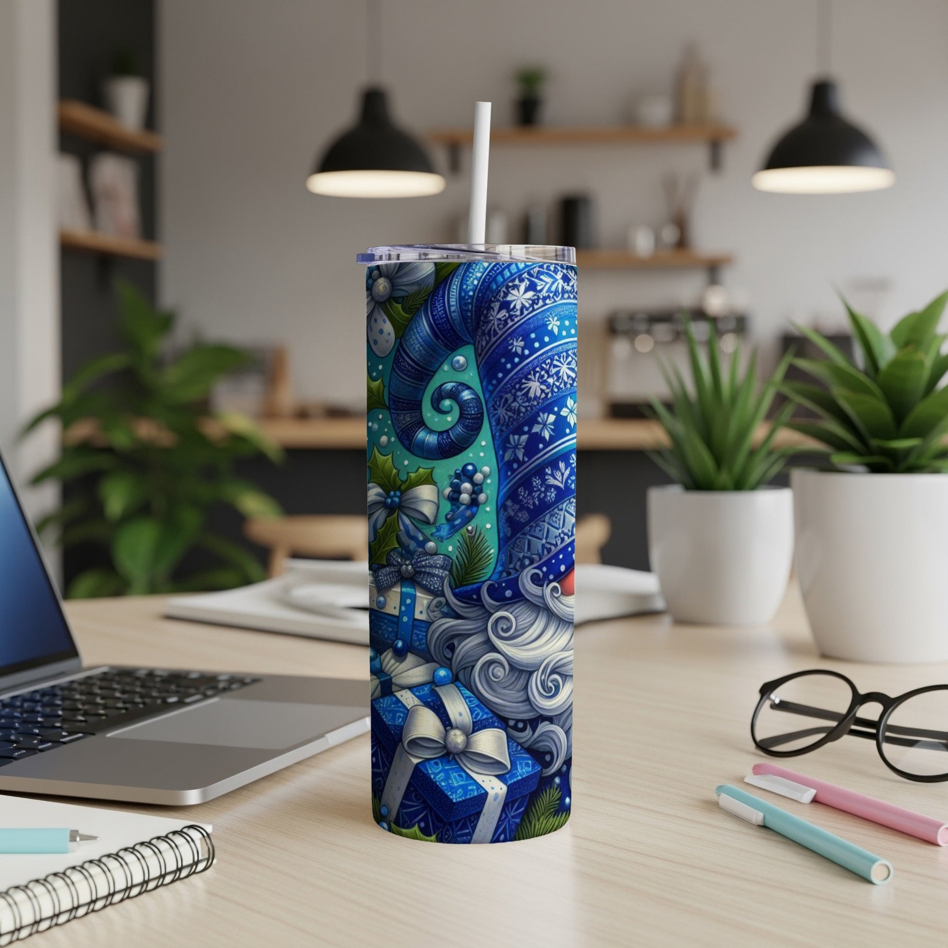 Blue Santa Claus tumbler with gifts, snowflakes, and winter patterns.