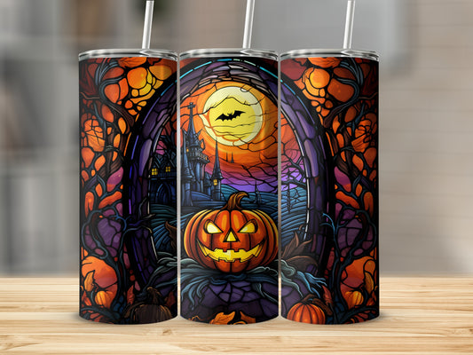 Halloween tumbler featuring a jack-o'-lantern and haunted castle under a full moon.