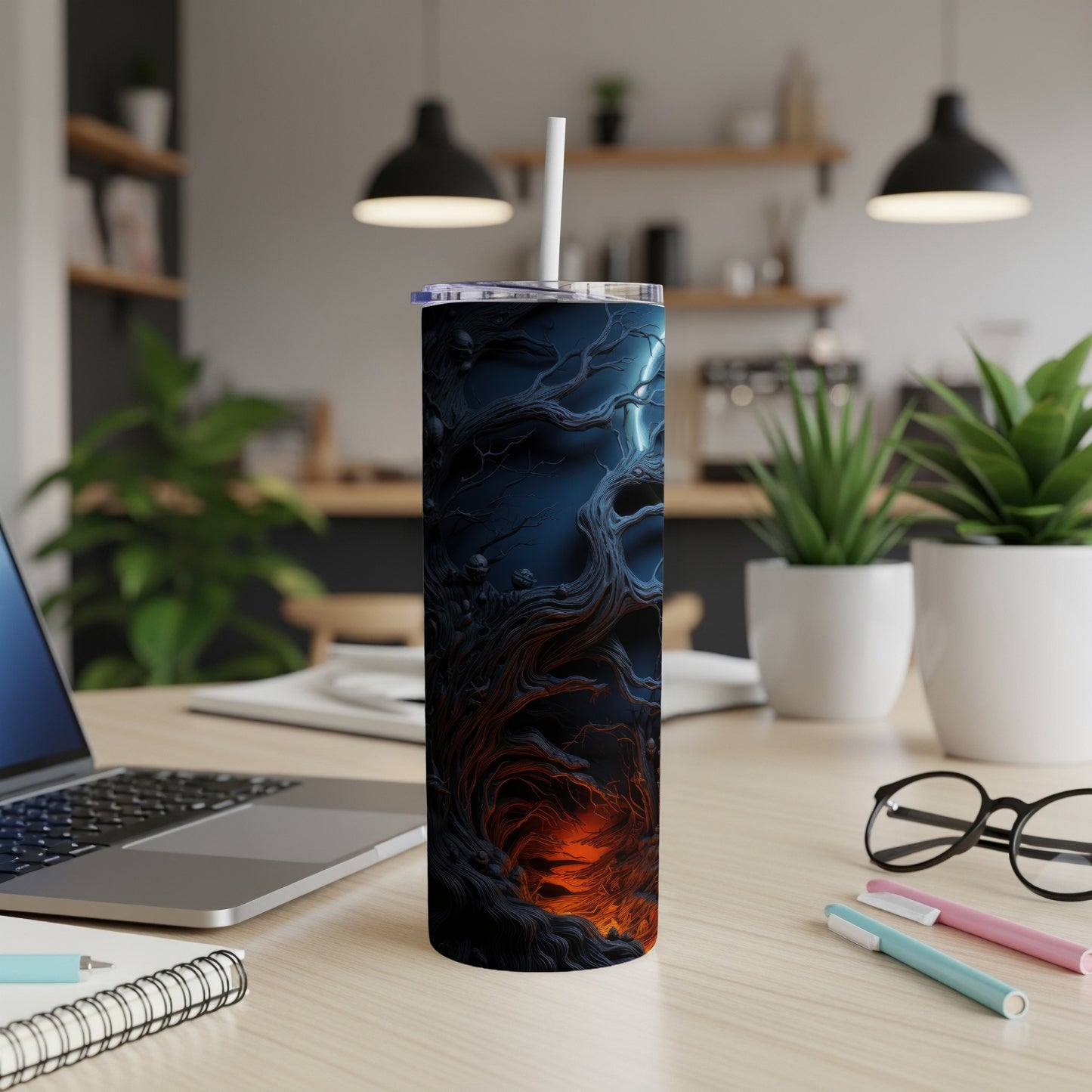 Tumbler with a dark, spooky forest and glowing orange undertones.