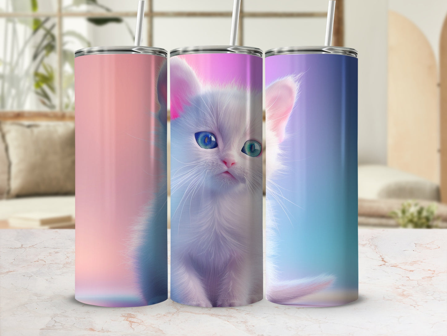 White kitten with blue eyes on a pink, purple, and blue ombre tumbler.