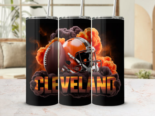 Cleveland Browns football helmet and ball surrounded by orange smoke.