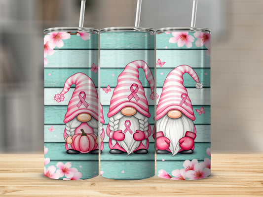 Gnomes with pink ribbons, butterflies, and pumpkins against a wood background.