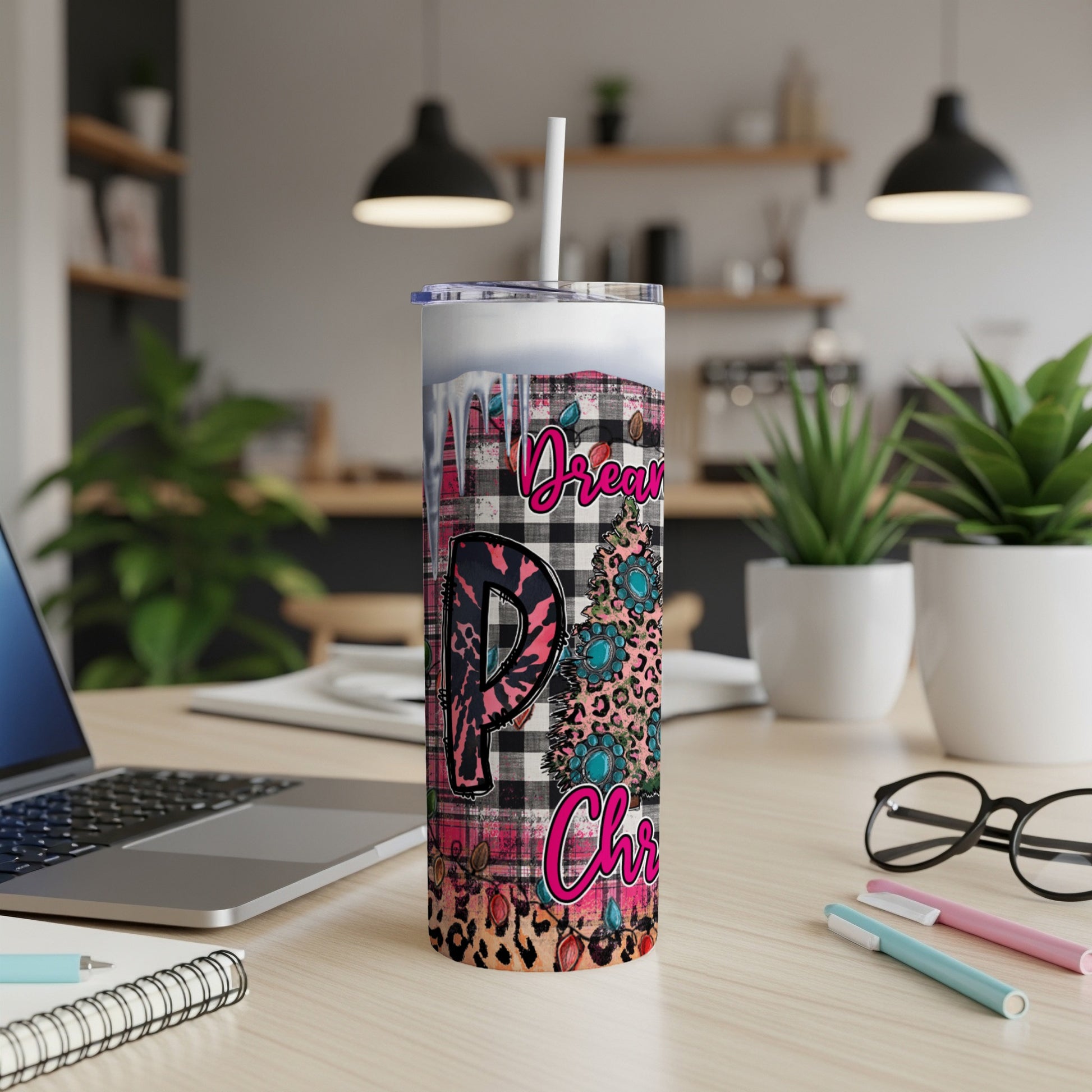 Tumbler with "Dream" and "Christmas" text and floral pattern.