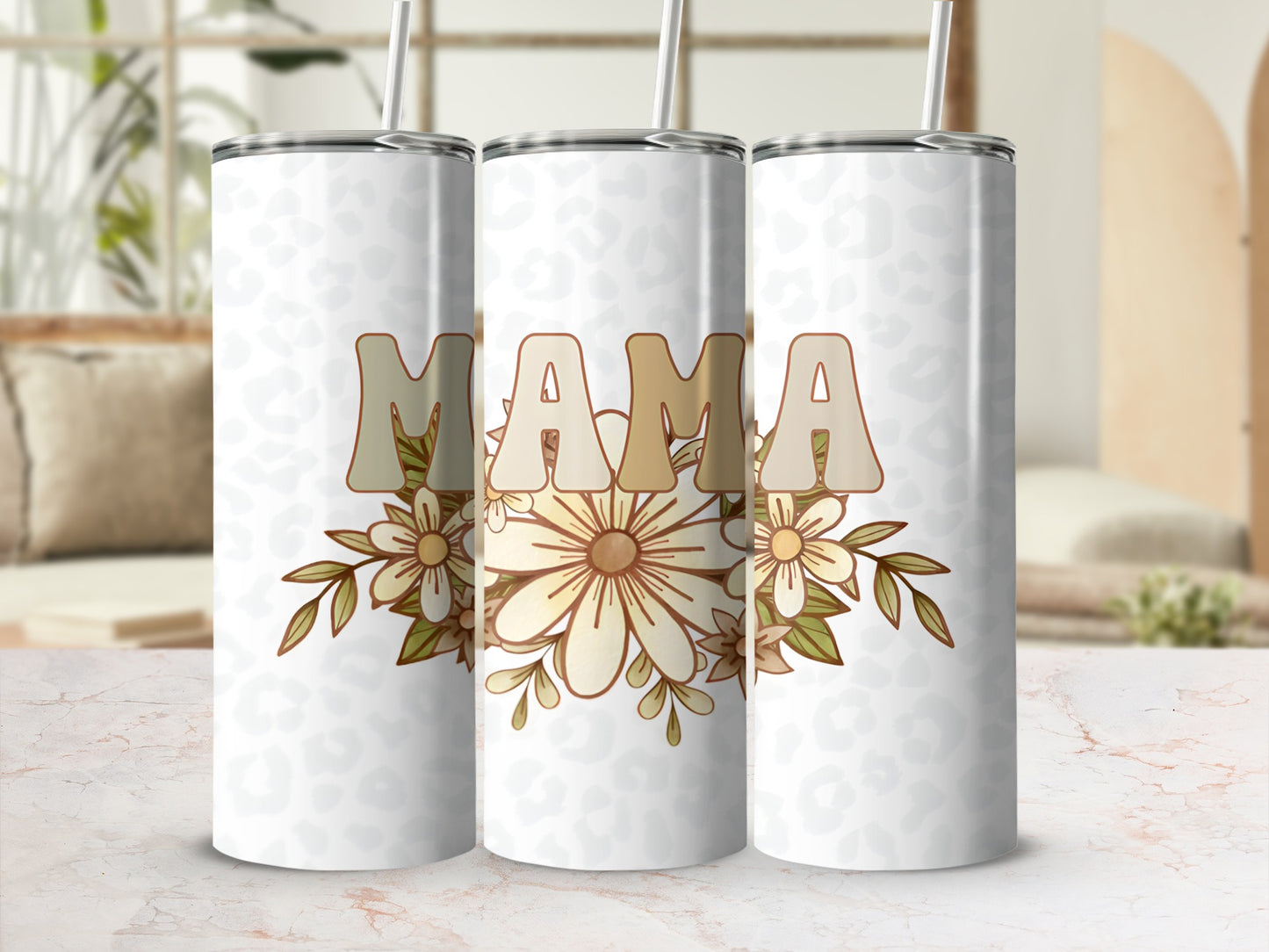White tumbler with "MAMA" in beige letters and floral accents.