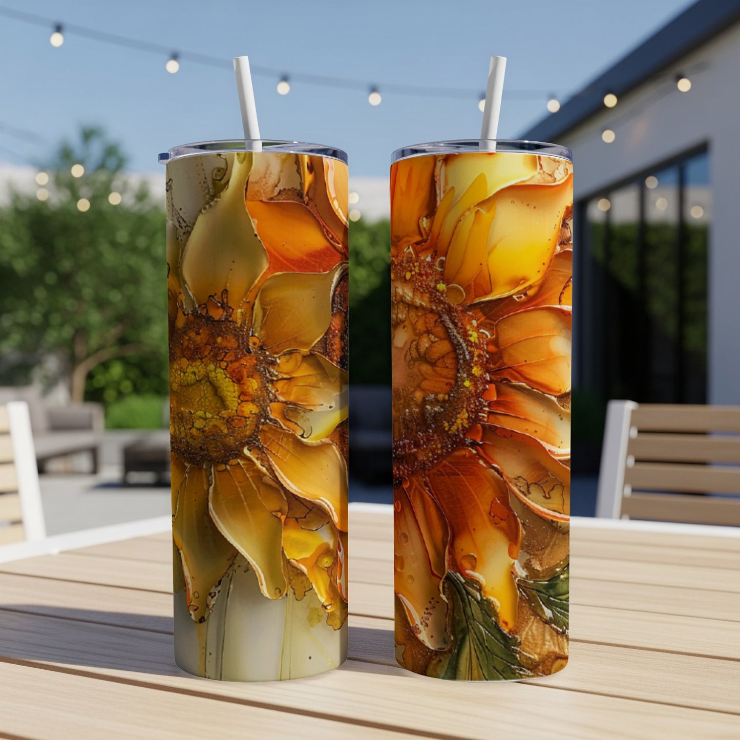 Two tall tumblers with close-up sunflower art design.