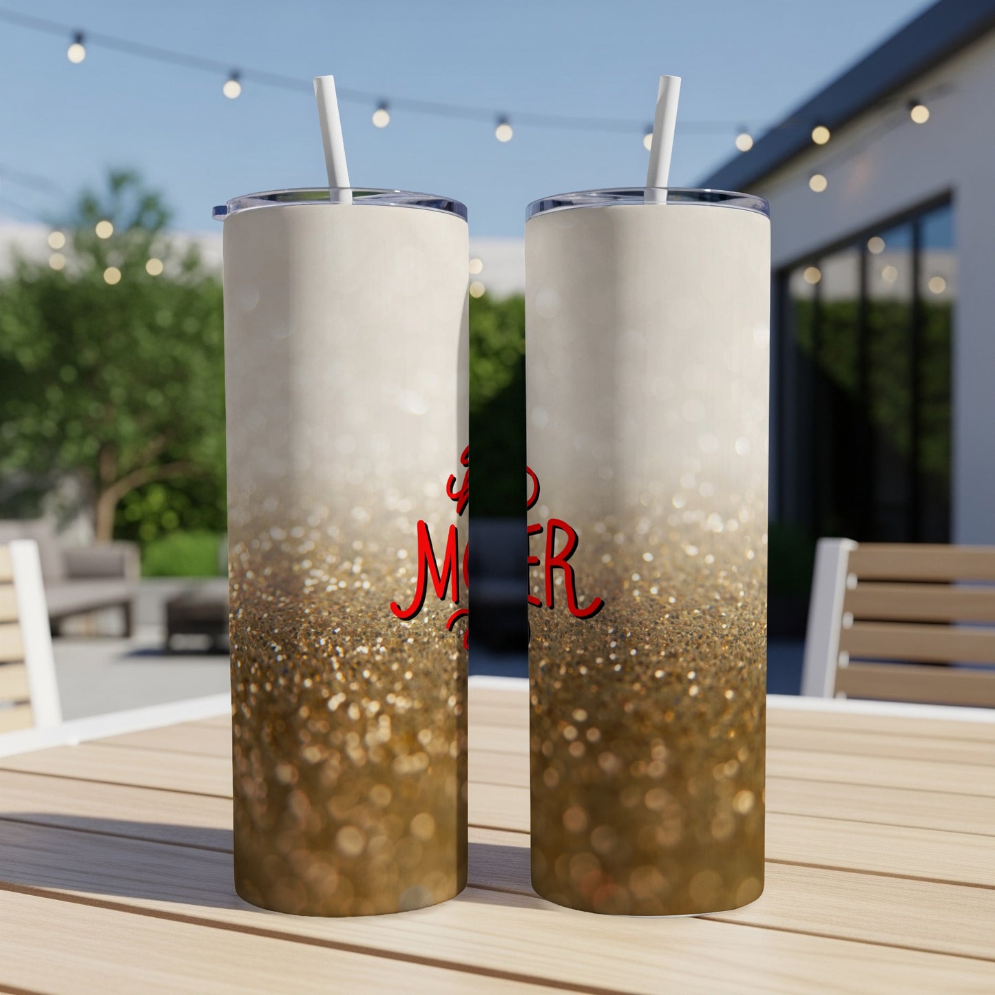 Two tumblers with "Merry" in red glitter and a champagne-colored top.