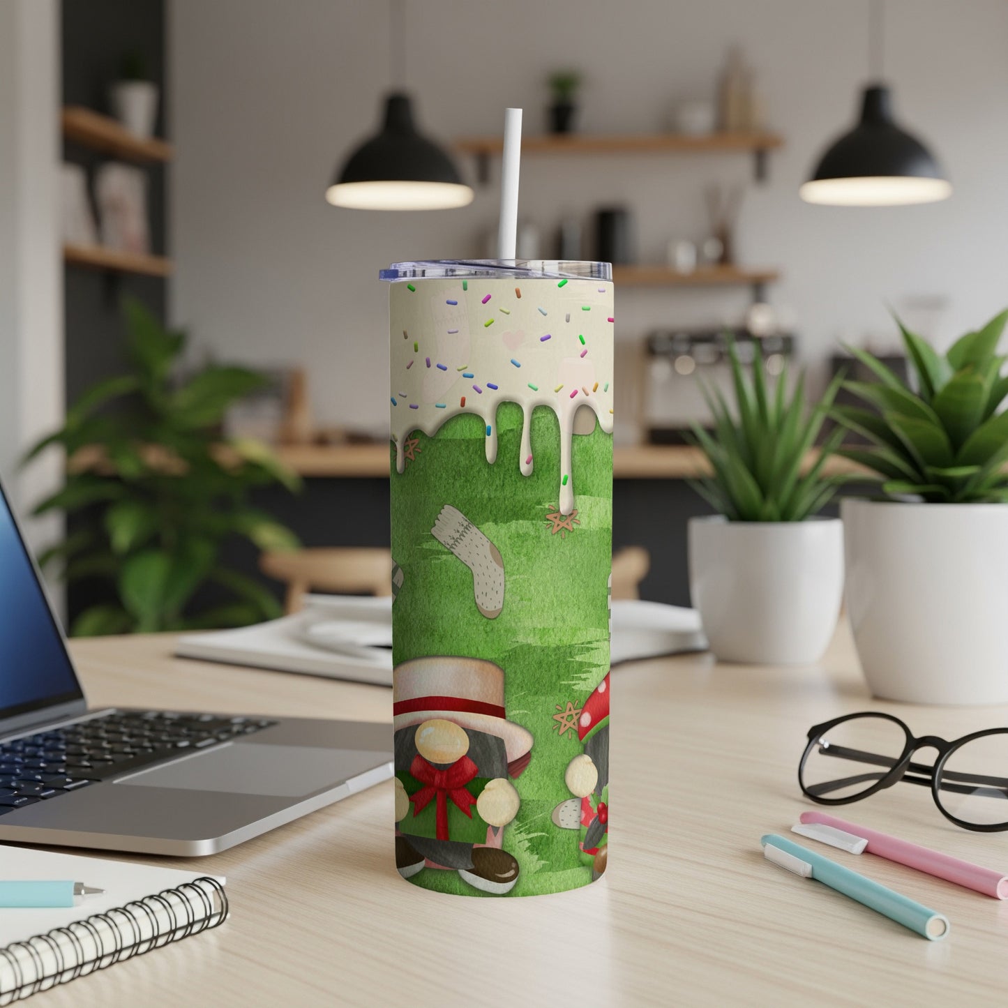 Tumbler with golf-themed cartoon characters and colorful sprinkles.