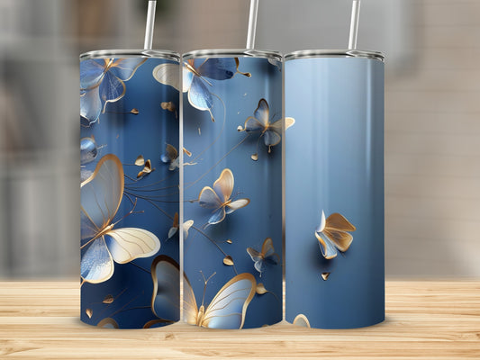Blue tumbler with gold and blue butterfly pattern.