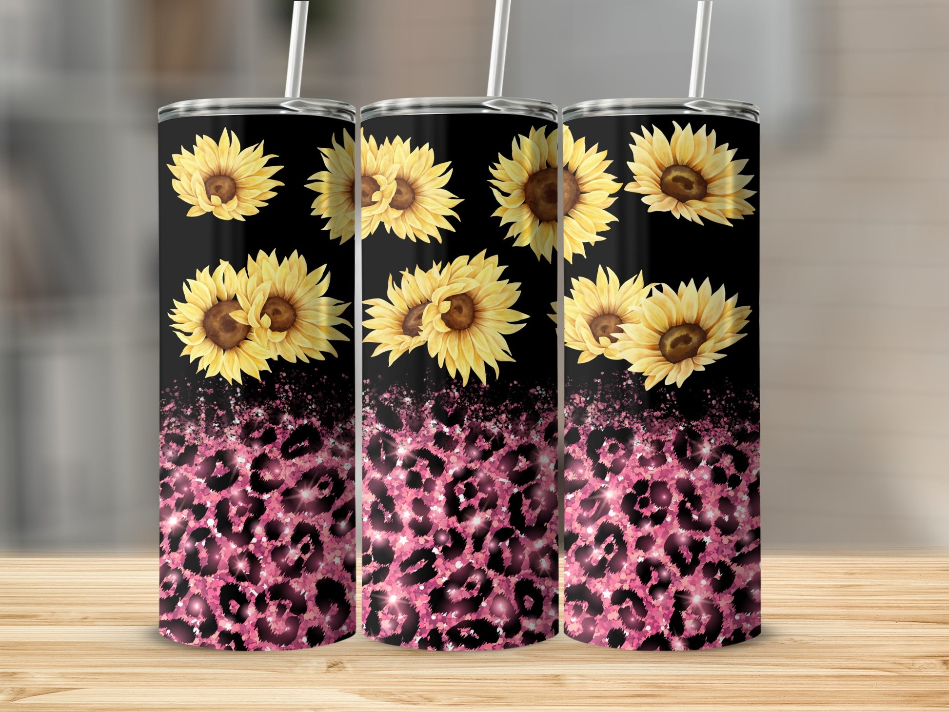 Black tumbler with sunflowers and pink leopard print design.