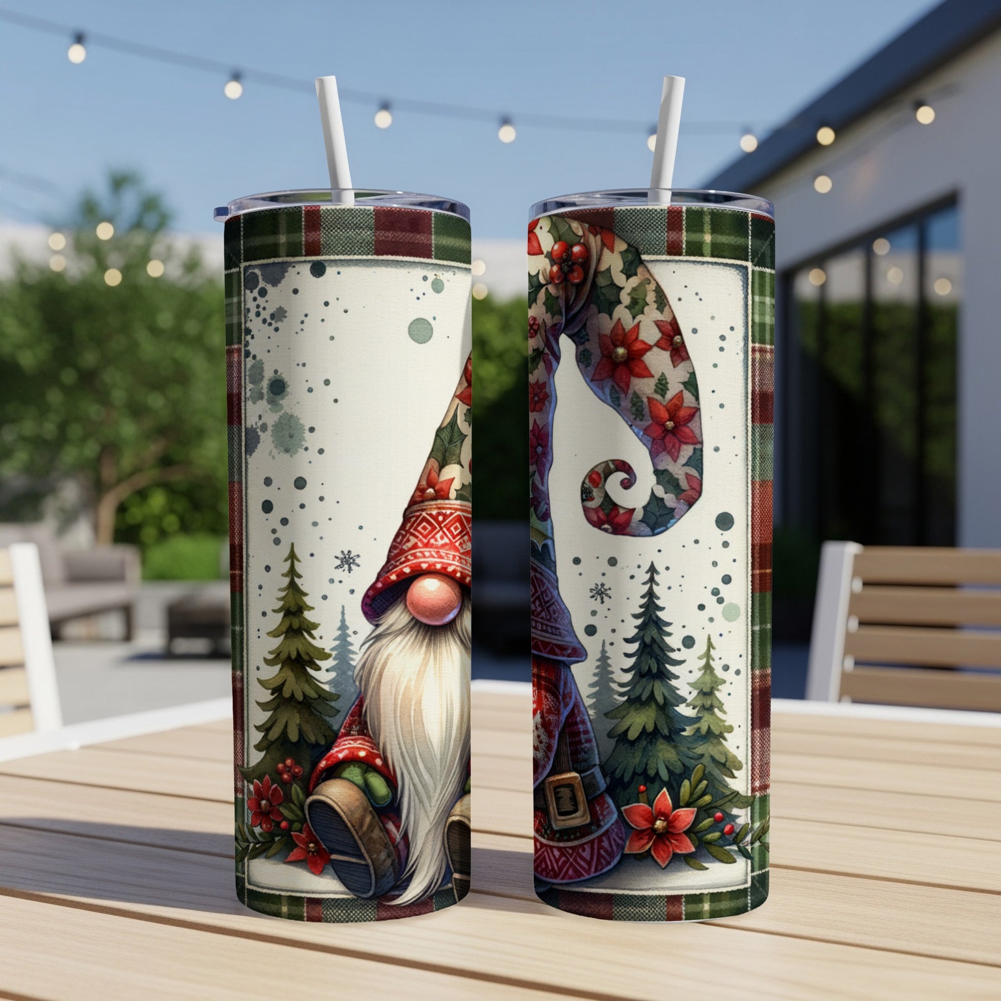 Two Christmas gnomes with poinsettias and trees on patterned tumblers.