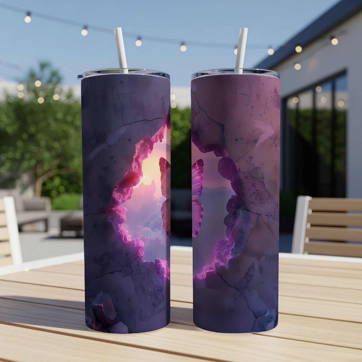 Two tumblers with cracked stone design revealing a sunset sky.