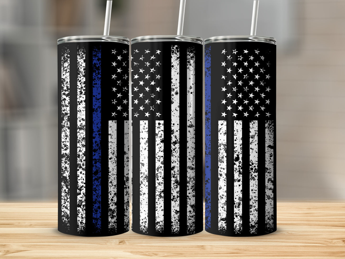 Three tumblers with distressed American flag and thin blue line design.