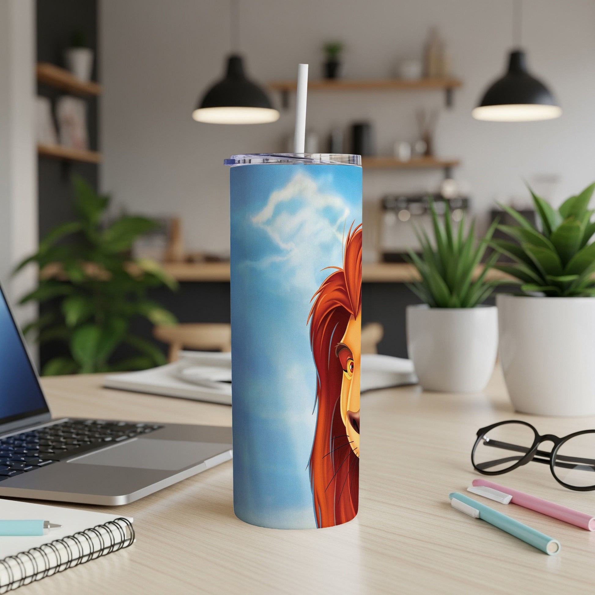 Simba from The Lion King on a blue, cloudy tumbler cup.