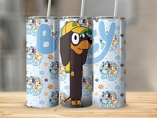 Bluey character tumbler with yellow cap and green bandana, light blue background.