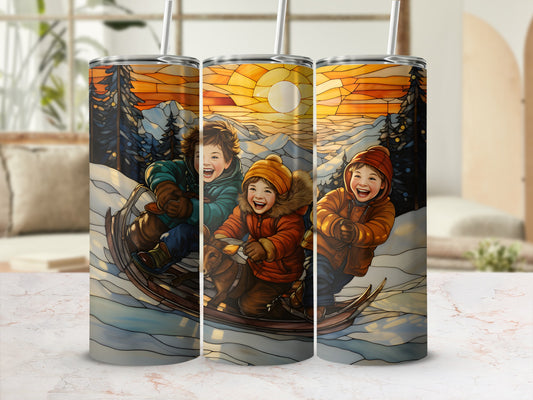 Three children on a sled in a snowy landscape with a sunset.