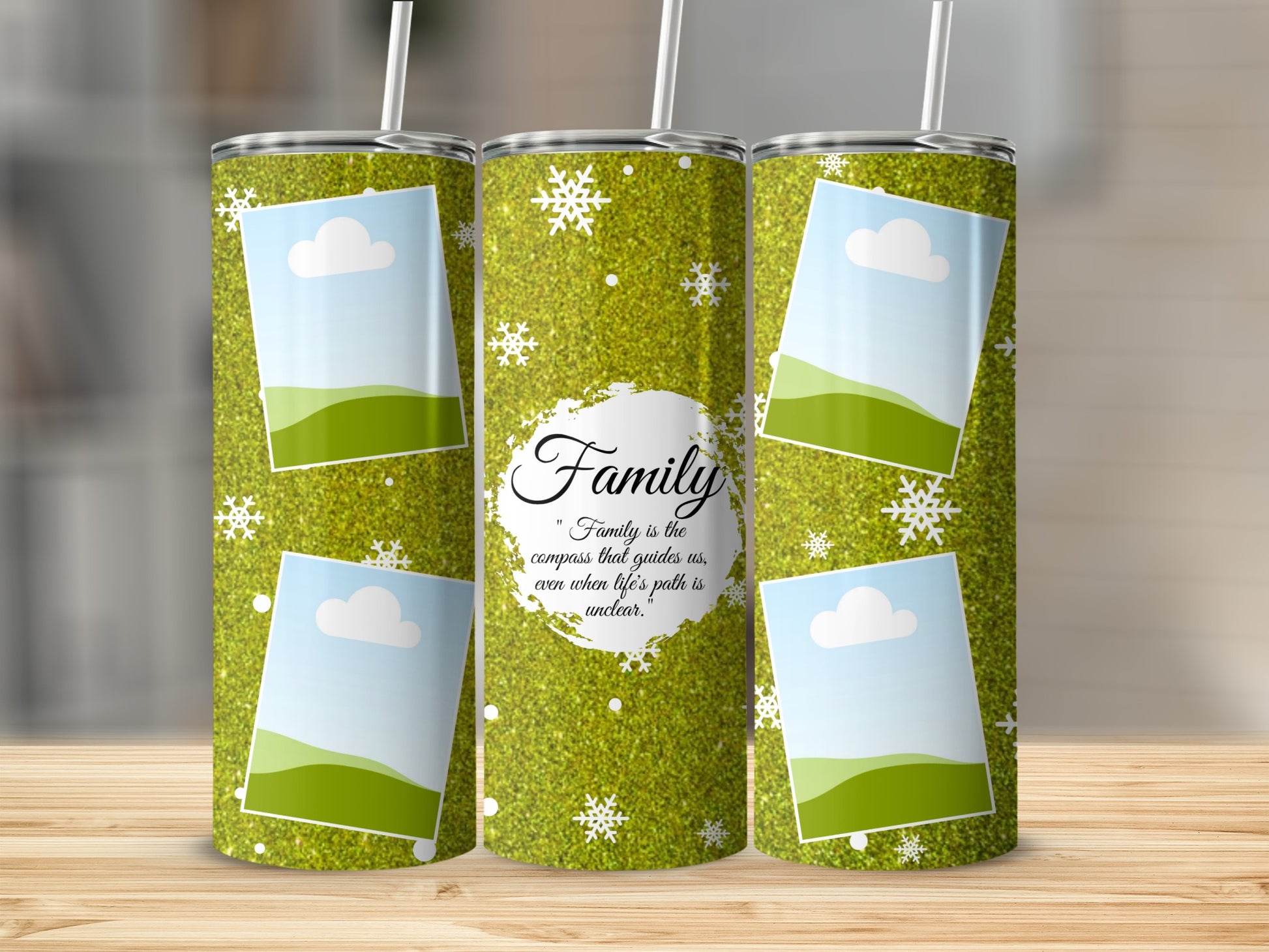 Three glittery green tumblers with a snowflake design and quote about family.