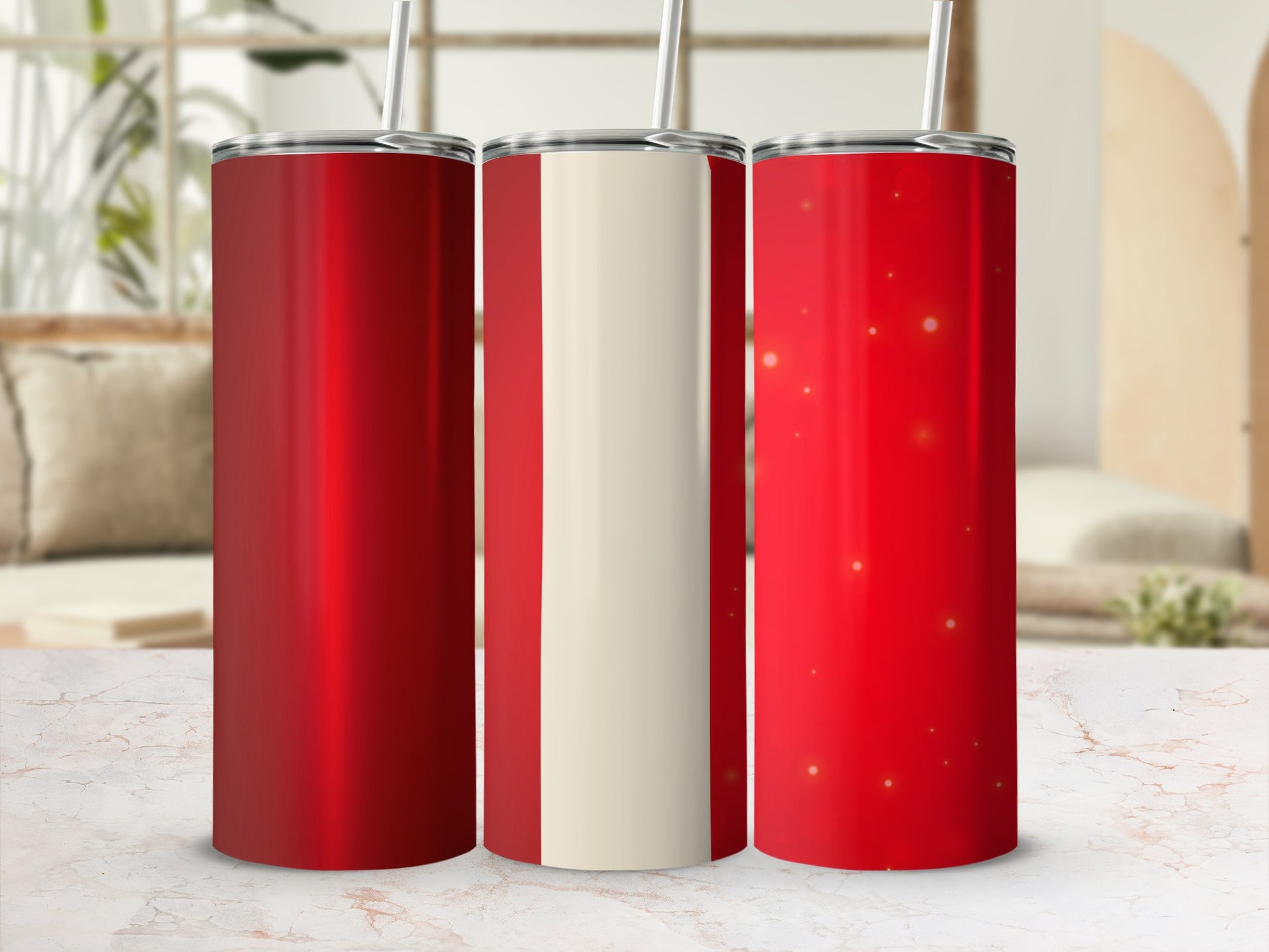 Three red and white striped tumblers with straws.