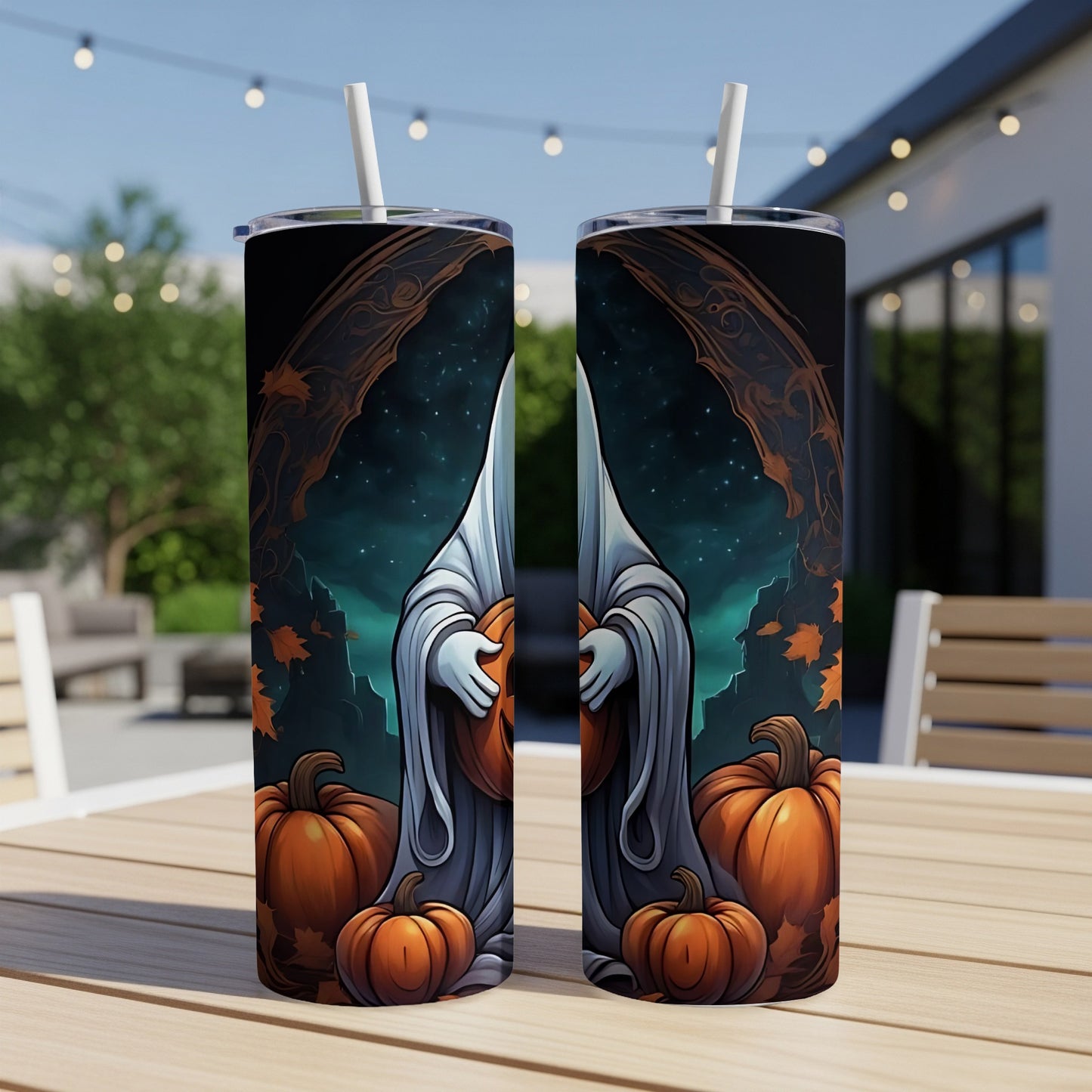 Two tumblers with a Halloween ghost holding a pumpkin design surrounded by pumpkins.