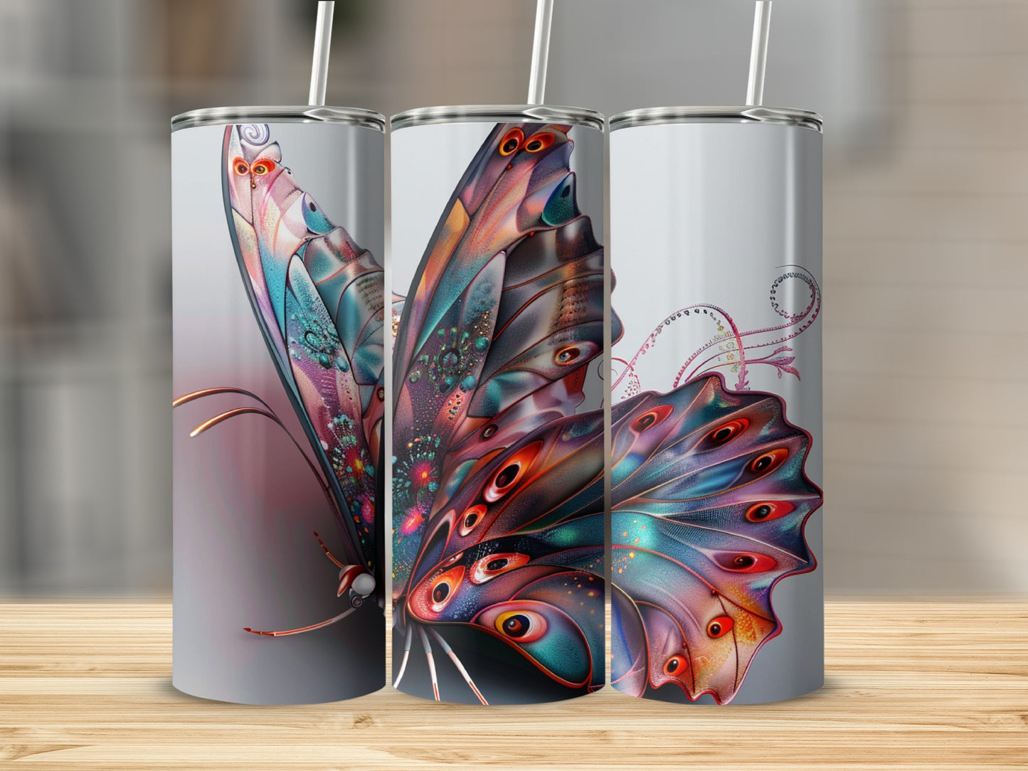 Three tumblers with a colorful, iridescent butterfly design.