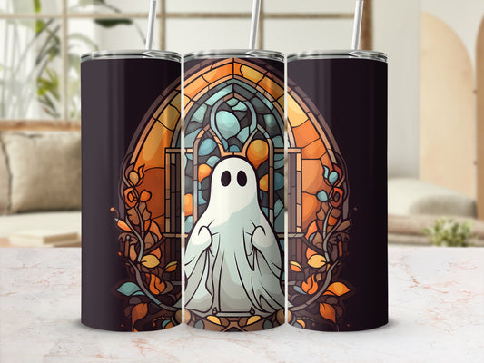 Ghost and stained glass design on a dark tumbler with a straw.
