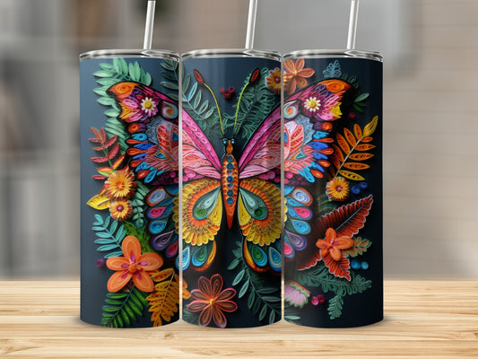 Three dark tumblers with vibrant, intricate butterfly and floral designs.