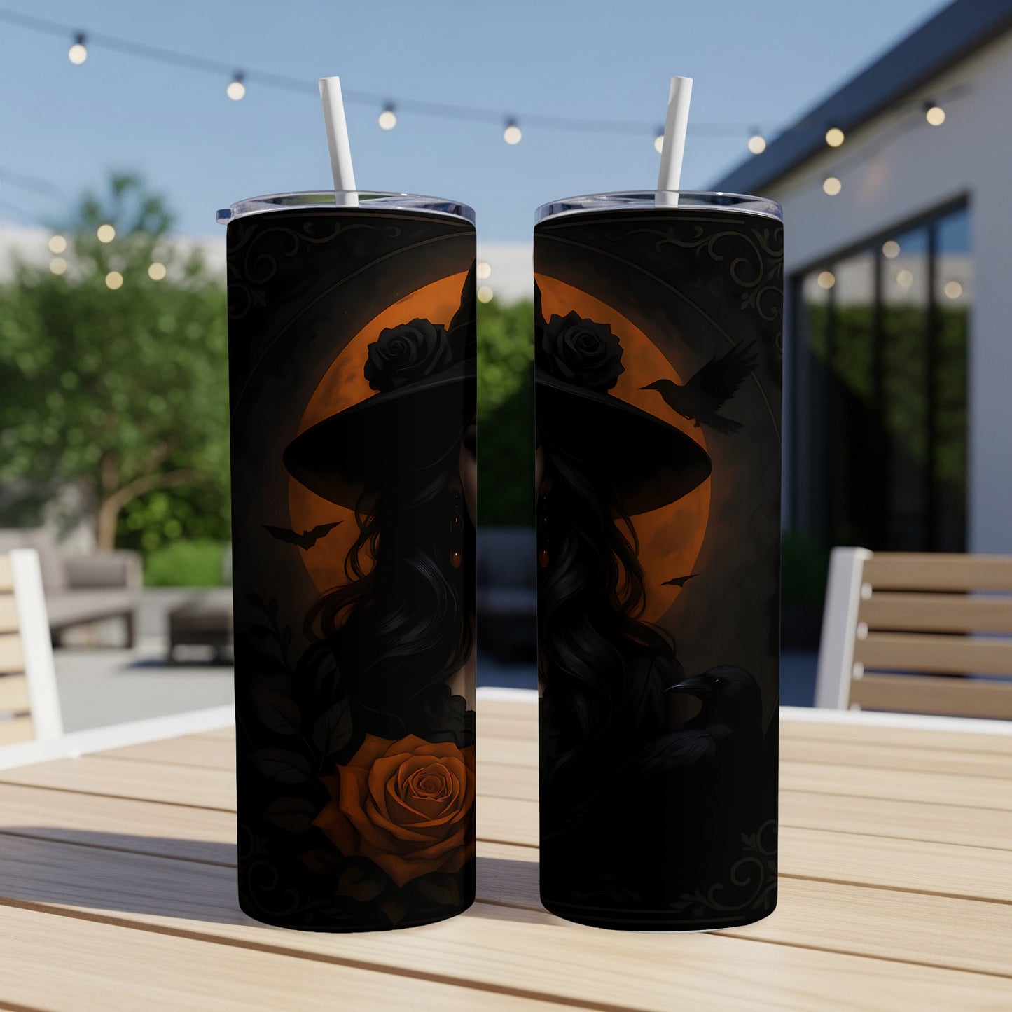 Two tumblers with witch and raven Halloween themed art, featuring black roses.