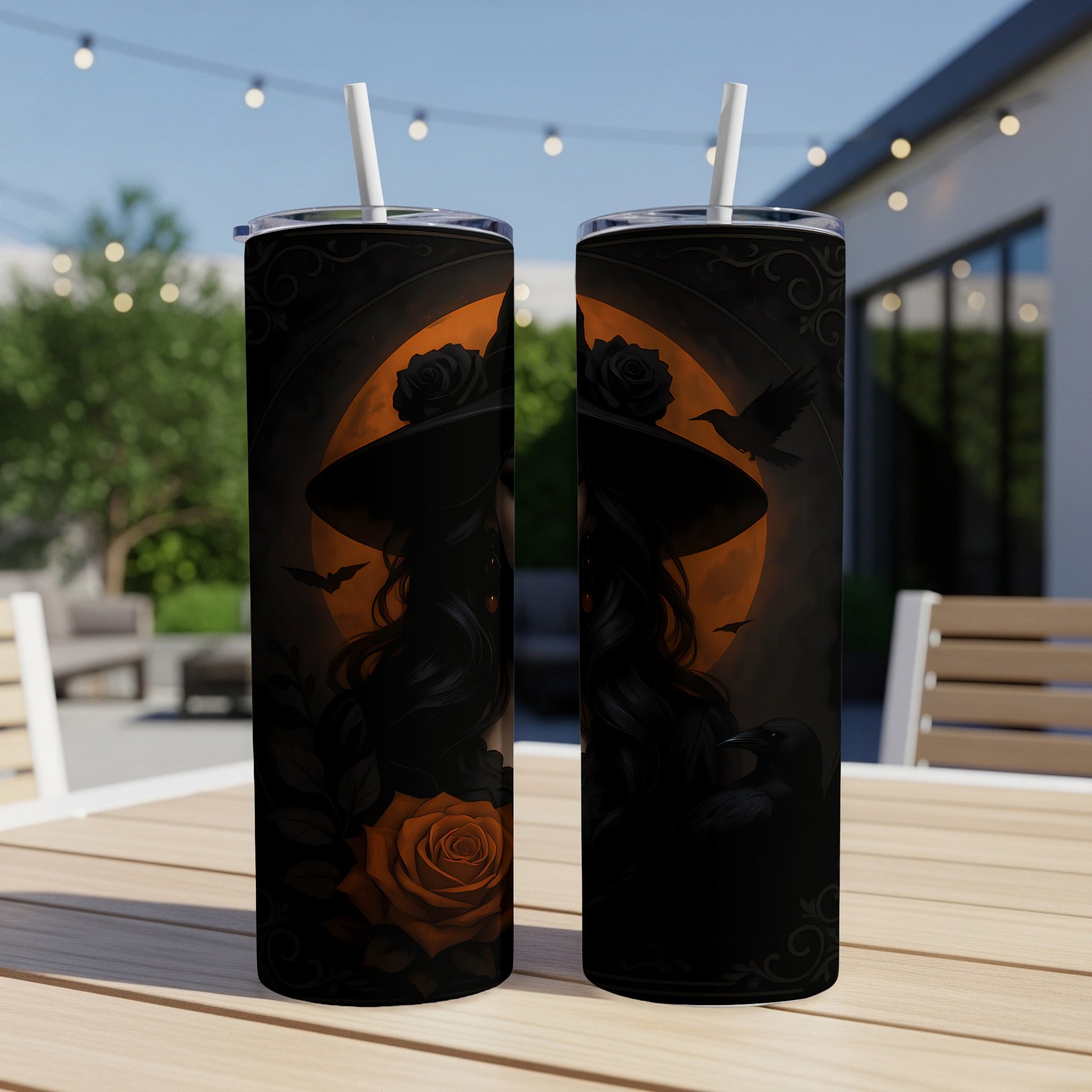 Two tumblers with witch and raven Halloween themed art, featuring black roses.