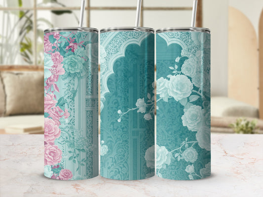 Teal tumbler with ornate floral patterns and arched window motif.