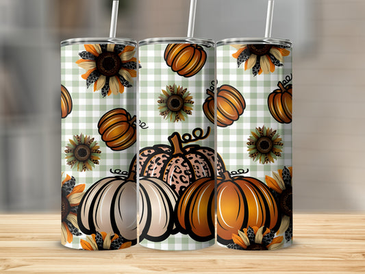 Fall-themed tumbler with pumpkins, sunflowers, and leopard print on checkered background.