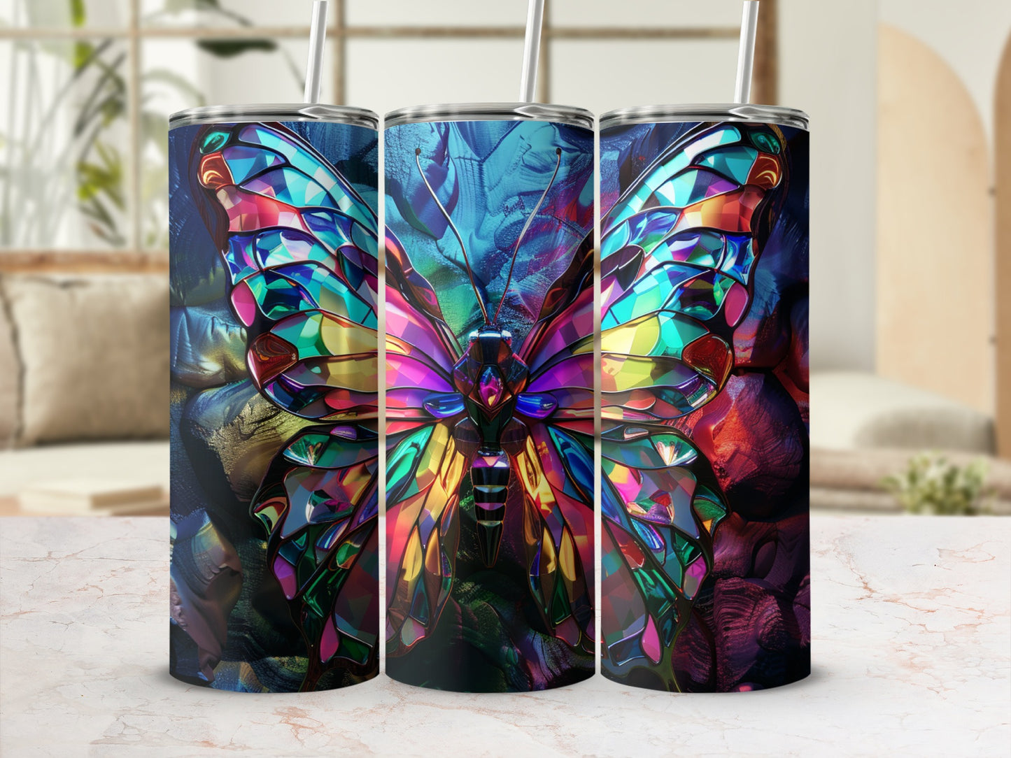 Three stainless steel tumblers featuring a colorful stained glass butterfly design.