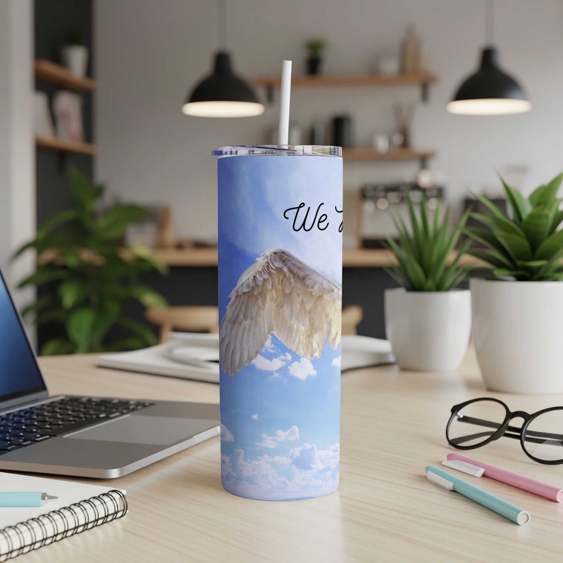 Blue tumbler with clouds, angel wings, and "We'll meet again" text.