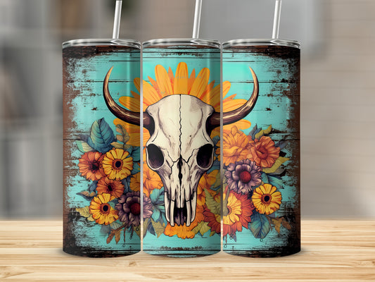Cow skull with flowers and teal background on three tumblers.