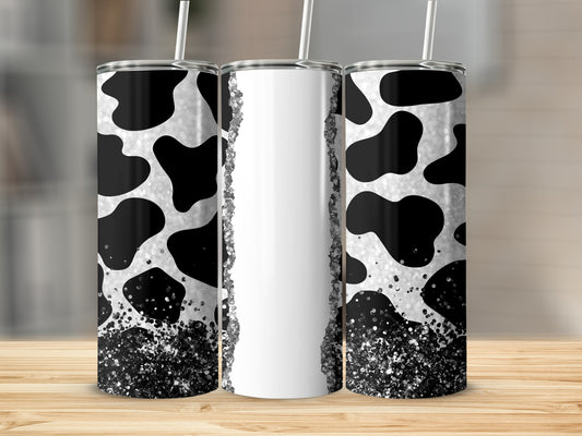 Three tumblers with black and white cow print and glitter accents.