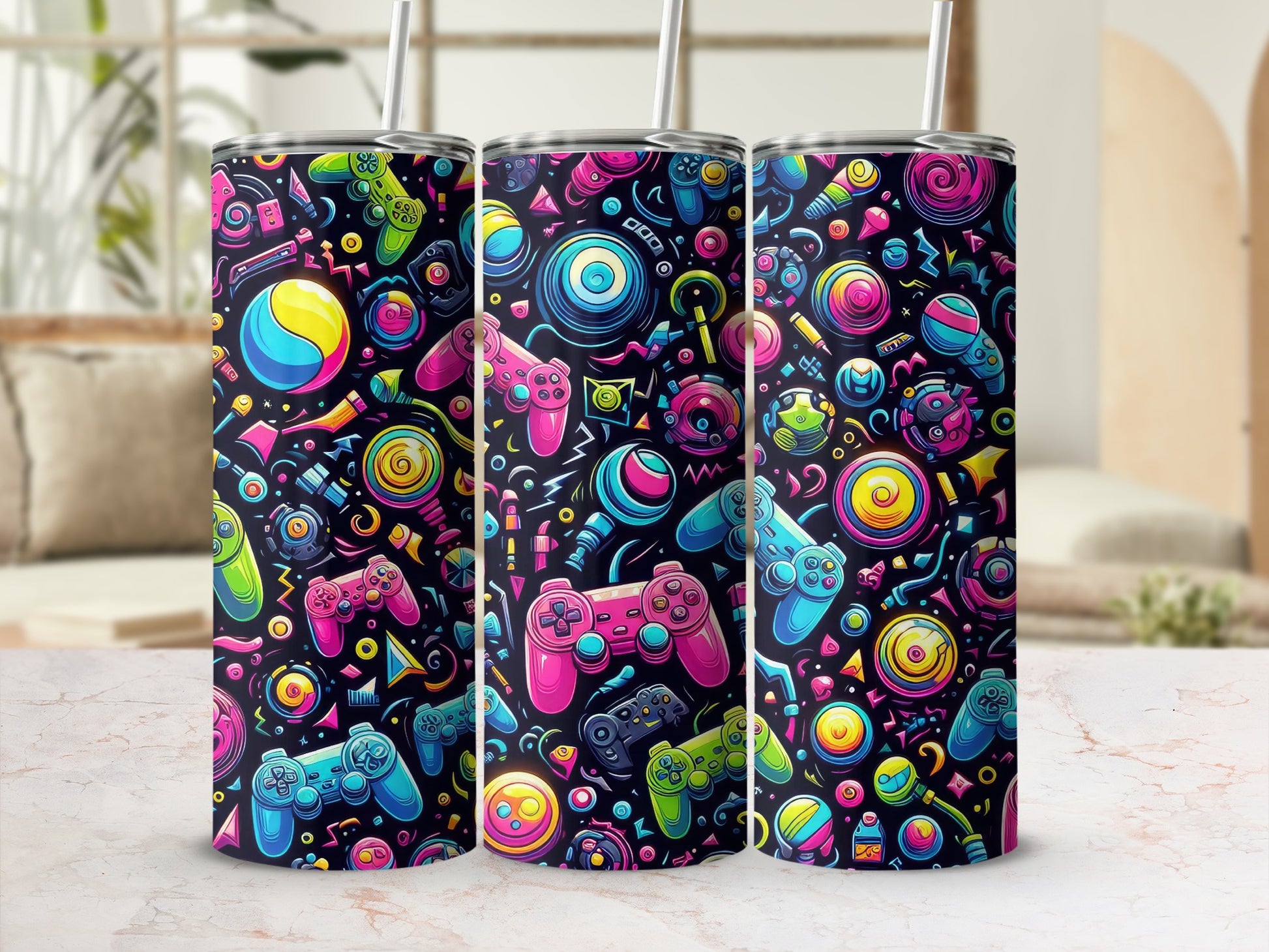 Tumbling rainbow retro video game controllers and colorful abstract shapes on a black tumbler.