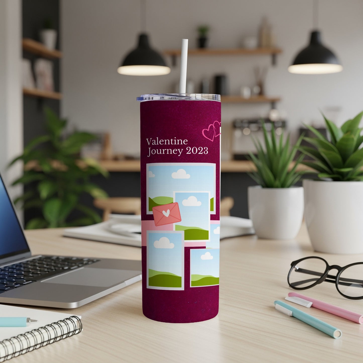 Maroon tumbler with "Valentine Journey 2023" text and collage of scenic photos.