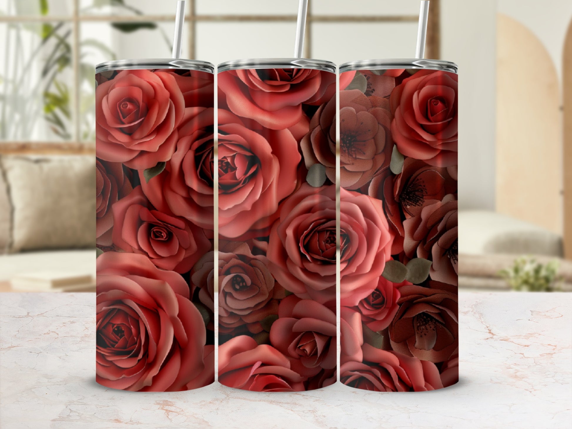 Three tumblers adorned with a close-up floral pattern of deep red roses.