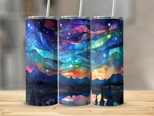 Three tumblers with a stained-glass sky and mountain landscape design.