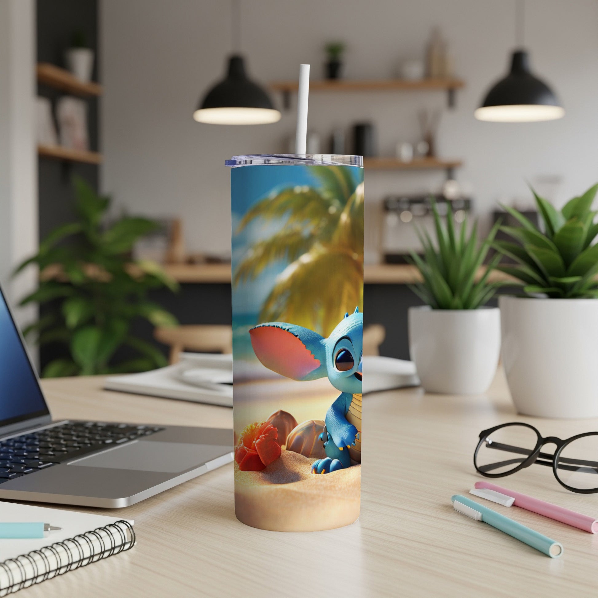 Blue alien character on sandy beach with palm tree on insulated tumbler.