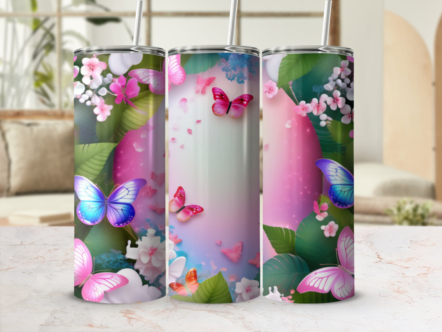 Three skinny tumblers with a pastel butterfly and floral design.