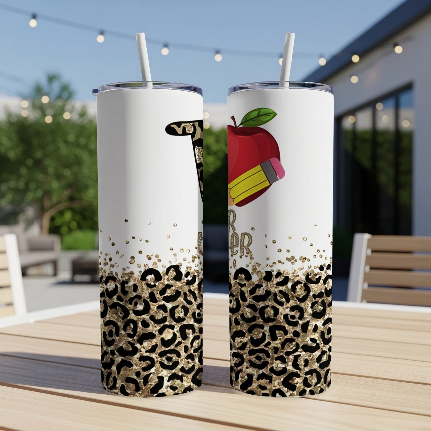 Two tumblers with leopard print and apple and pencil designs.