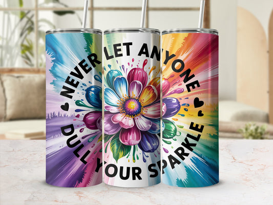 Three tumblers with colorful flower and heart designs, saying "Never dull your sparkle."