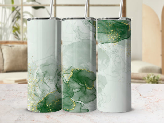 Three tumblers with abstract green and gold marbling patterns.