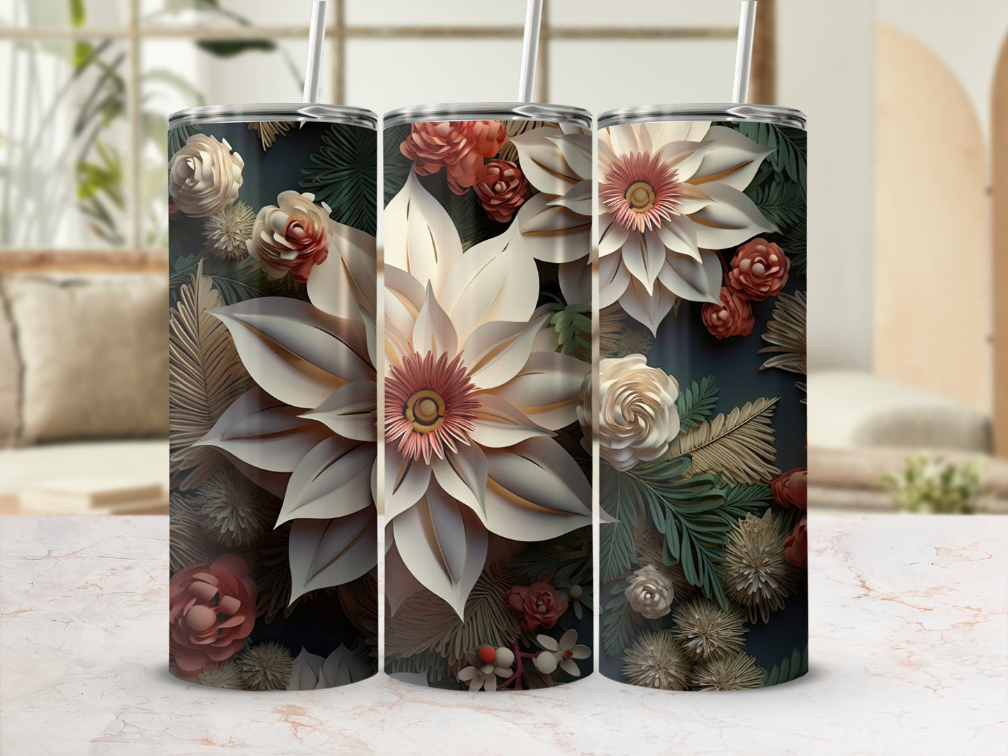 Three floral tumblers with detailed flower and foliage designs on a light background.