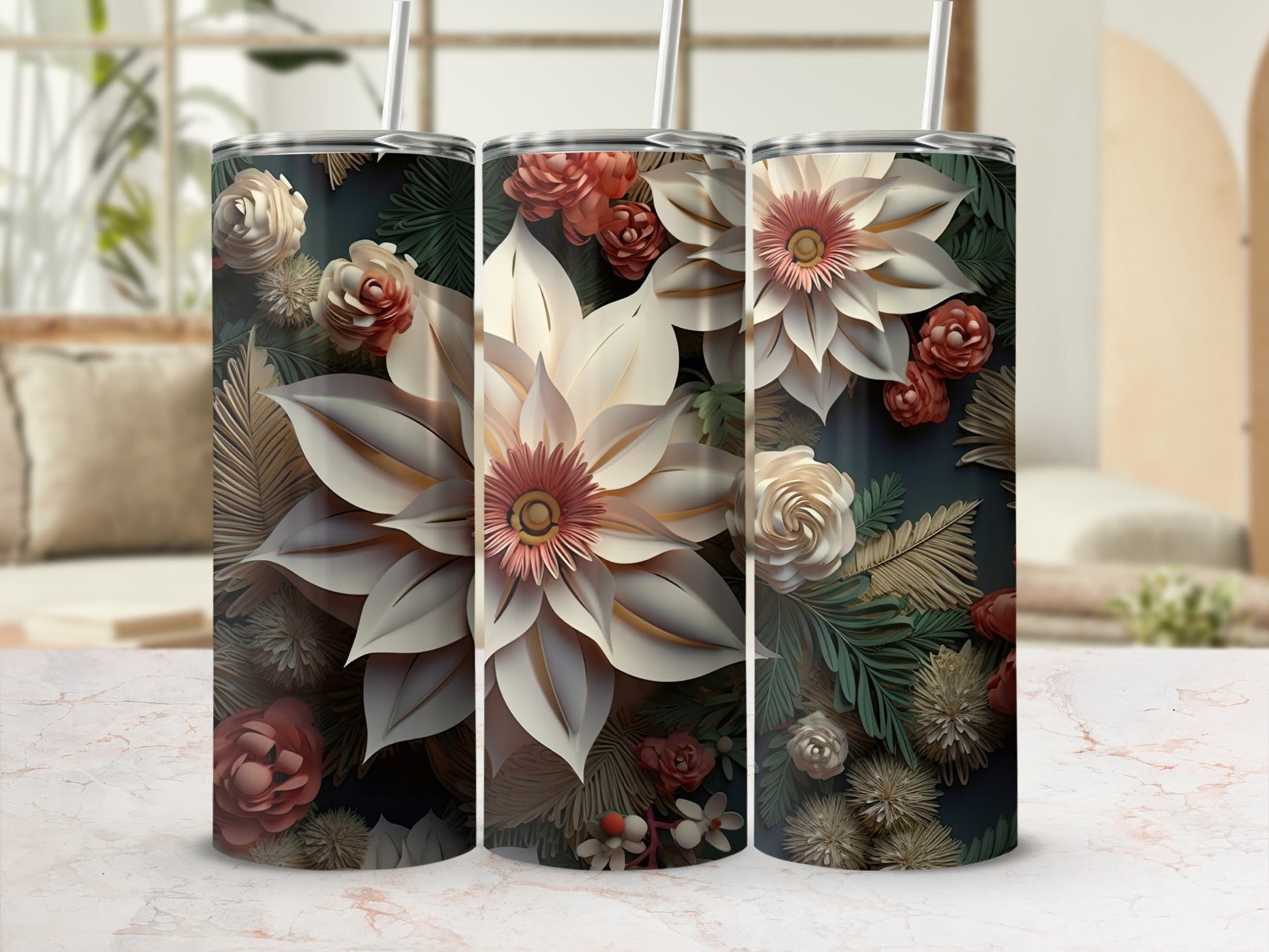 Three floral tumblers with detailed flower and foliage designs on a light background.