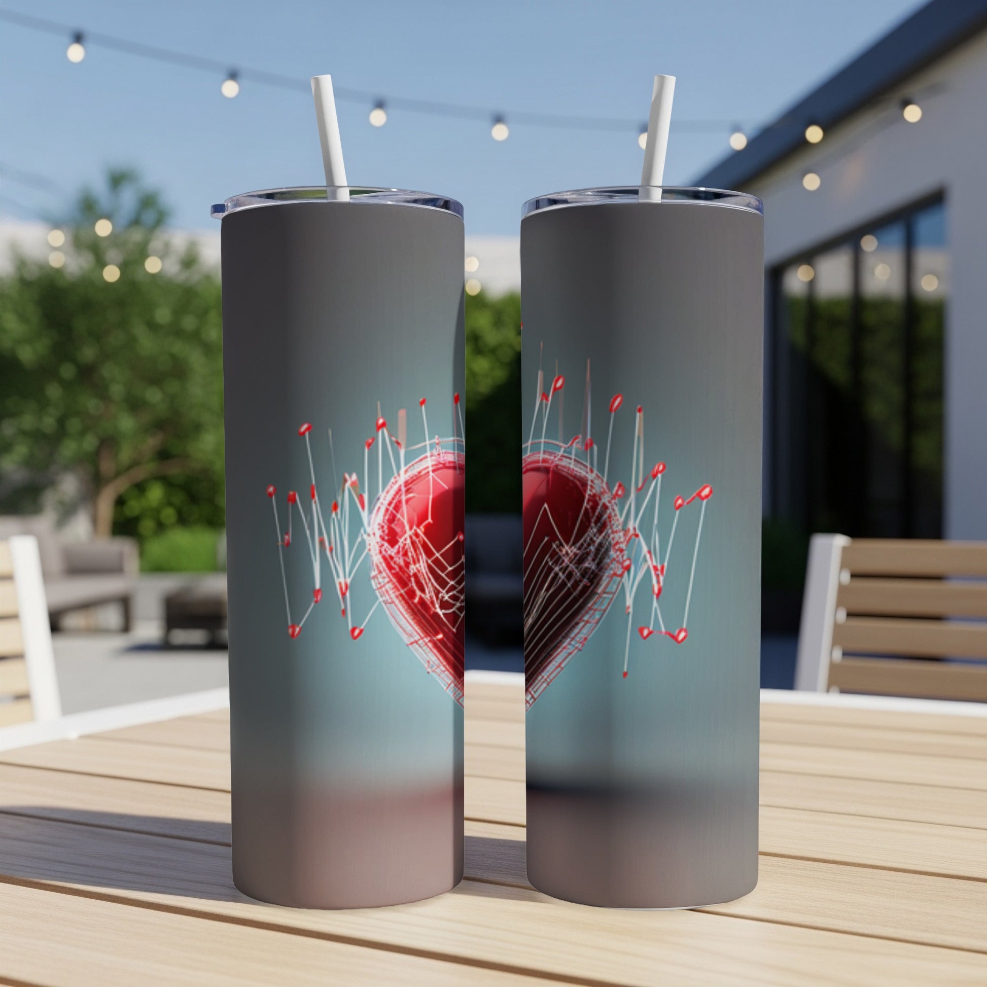 Two tall tumblers with a red heart and soundwave design.