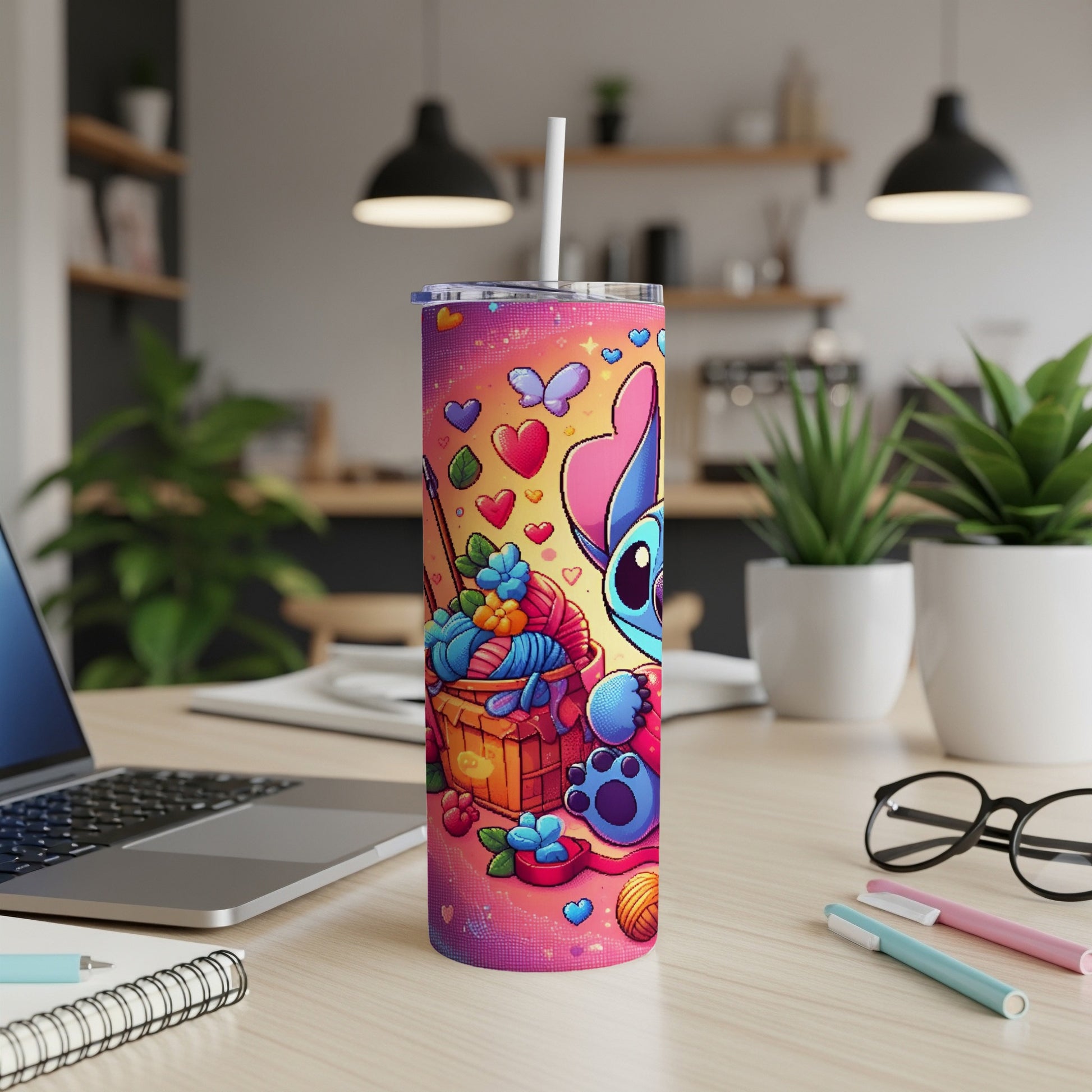 Stitch character design on a pink patterned tumbler with yarn and hearts.