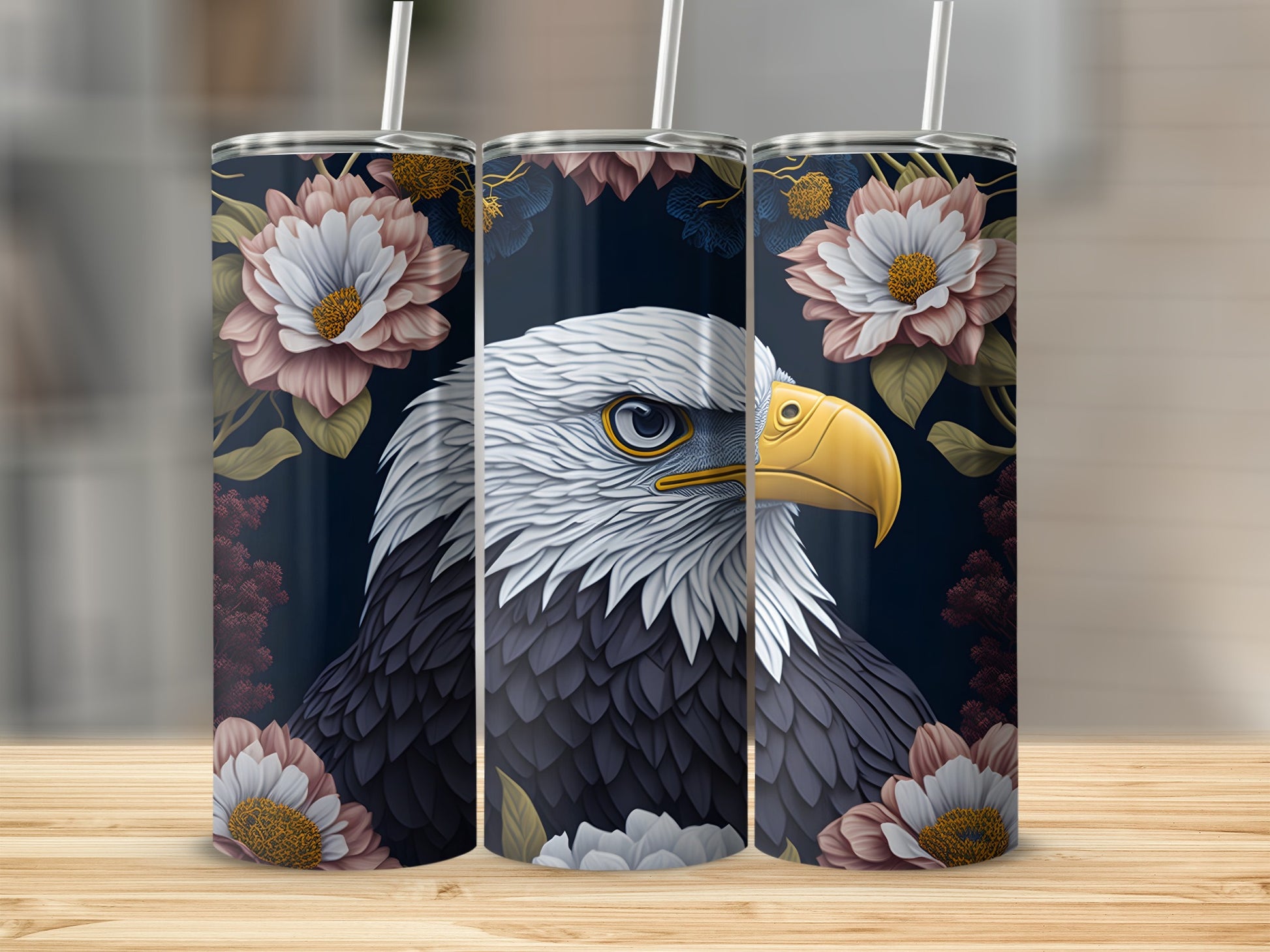 Tumbler with eagle and floral design.