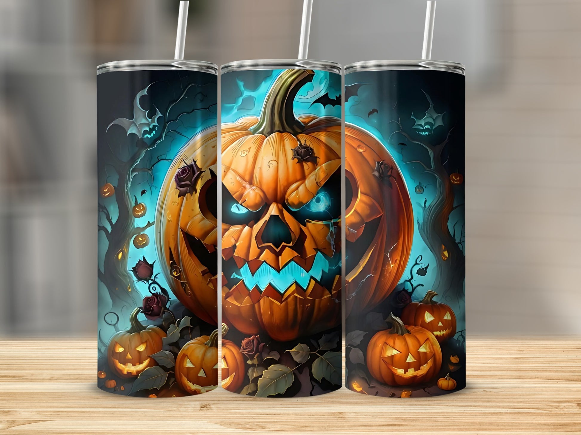 Halloween tumblers with a spooky jack-o'-lantern and pumpkin design.