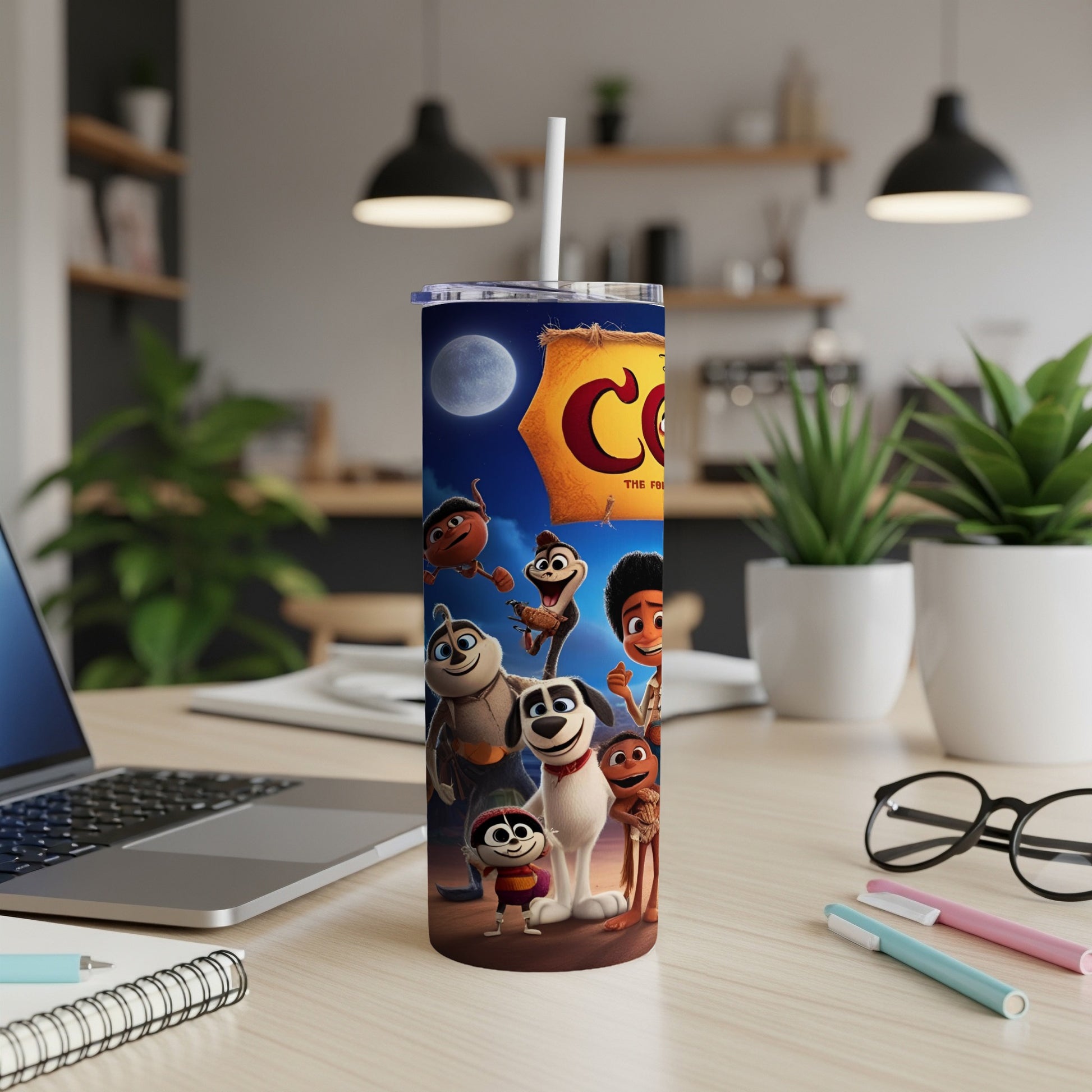 Characters from "The Frightoons" movie on a blue tumbler with straw.