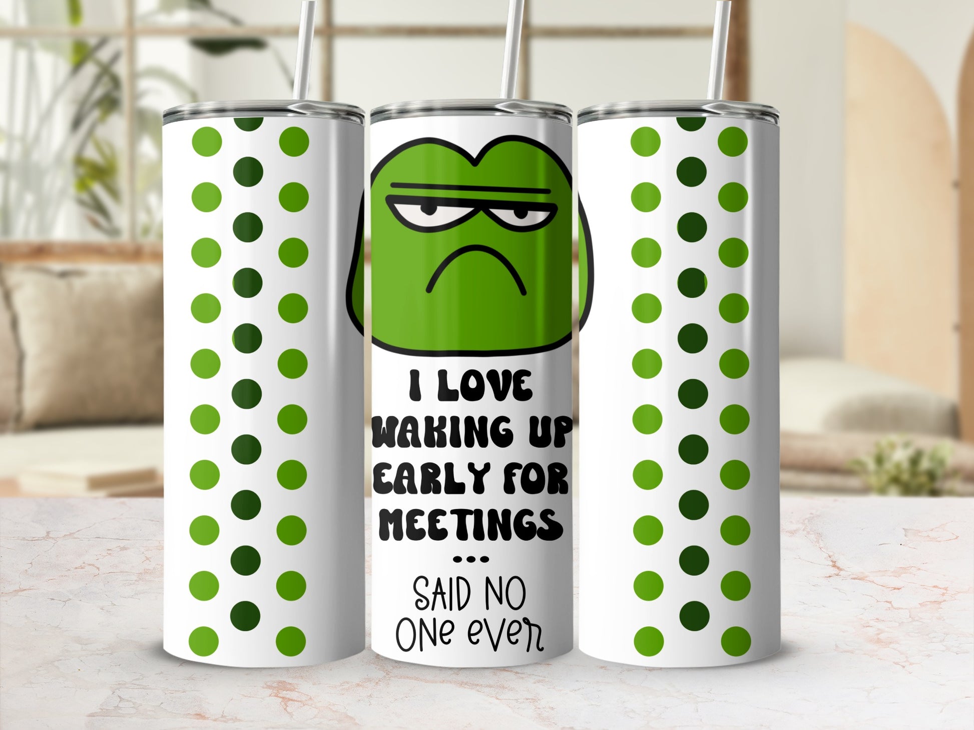 Green grumpy face tumbler with polka dots and humorous text.